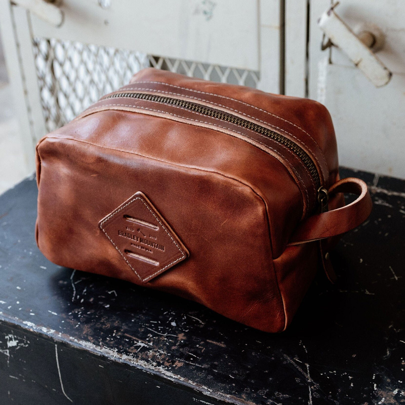 brown dopp bag